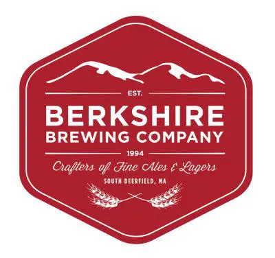 Red shield-shaped logo for Berkshire Brewing Company, featuring flying birds, crossed wheat stalks, and white lettering.